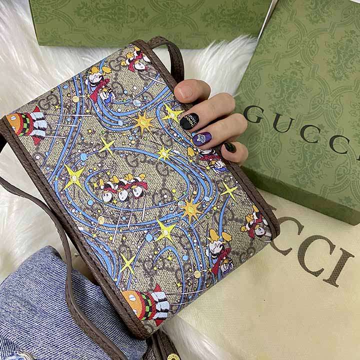 Gucciアイホン12 プロマックス携帯ケースドナルドダック